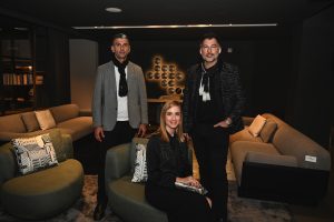 Guests enjoy a relaxed moment amid the showroom