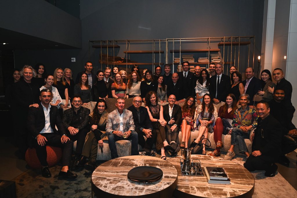 A wonderful group moment capturing the energy of the night as guests, designers and friends gather in the elegant showroom, enjoying design, conversation and a warm sense of community.